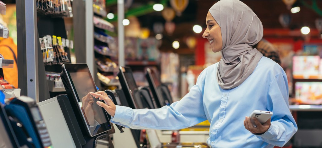 Woman at Self-Checkout